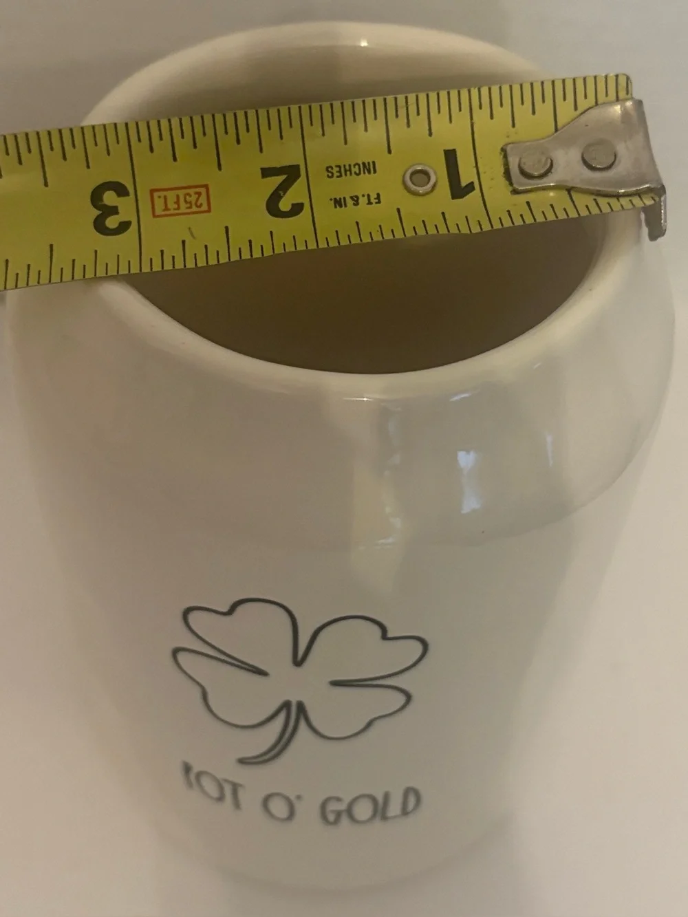 Rae Dunn off White Ceramic 'POT O’GOLD’ Canister with Green Handle covered lid.